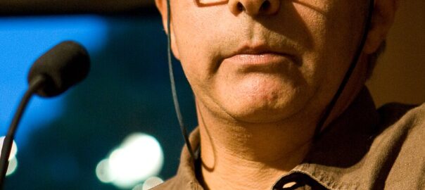 A colour photograph of the author Hanif Kureishi