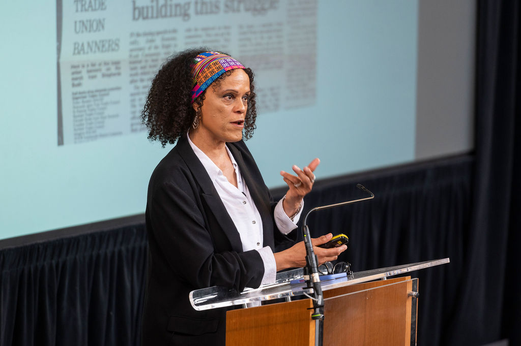 A photograph of Bernardine Evaristo at a lectern